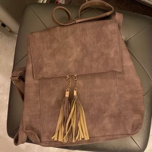 Maybe backpack/ cross body bag.